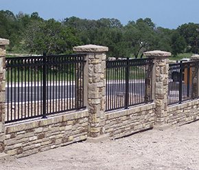 Iron fence in wall